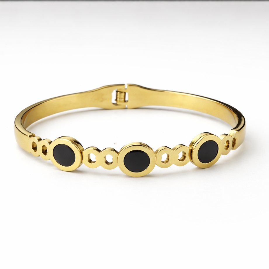 Elegant gold bracelet with onyx details