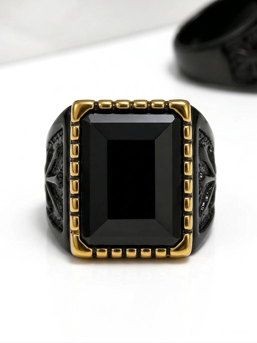 Black signet ring with gold accents