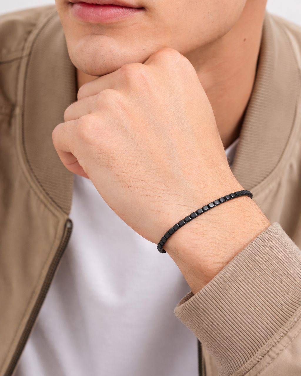 Sleek black bracelet on model's wrist